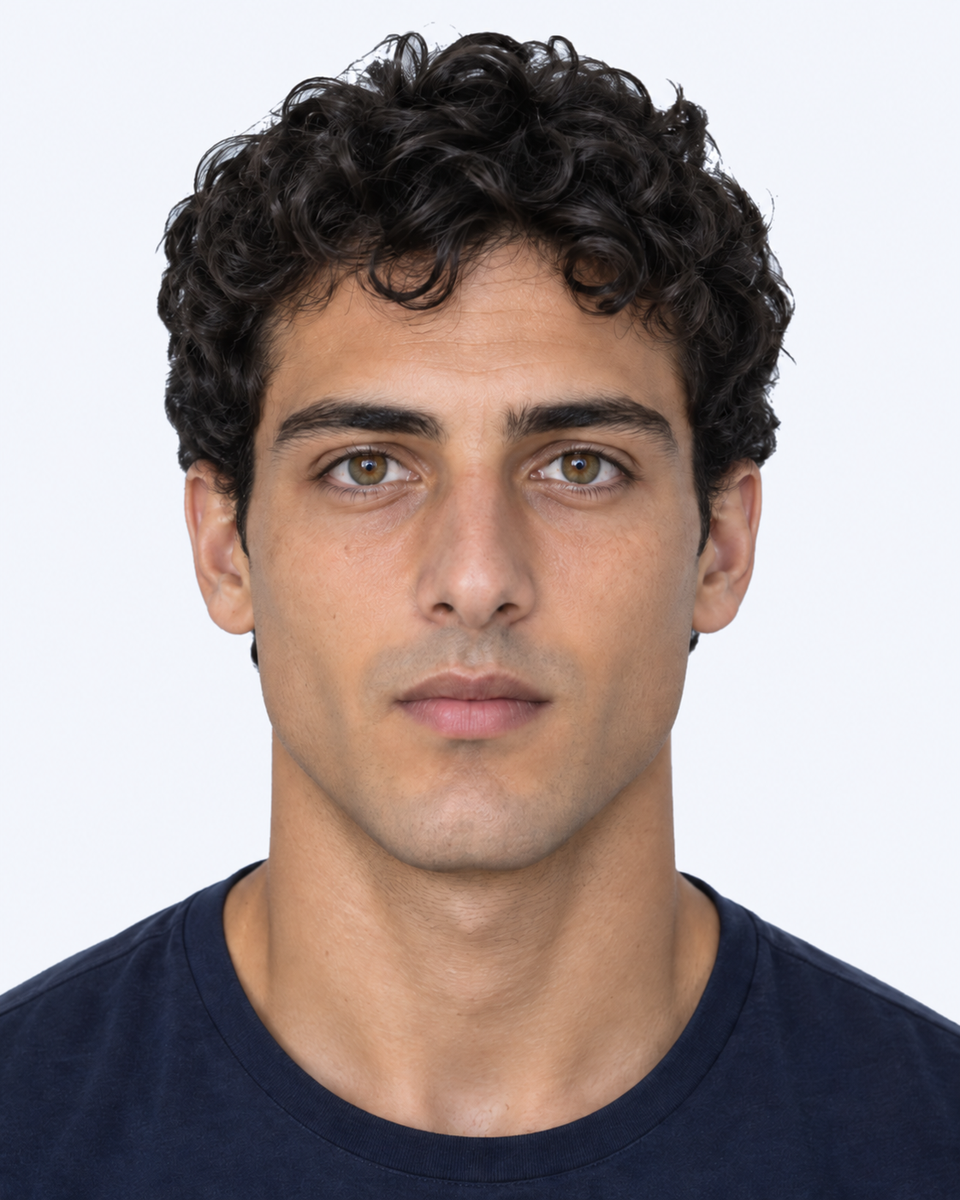 Same-person synthetic frontal portrait: The mouth is narrower relative to pupil spacing.